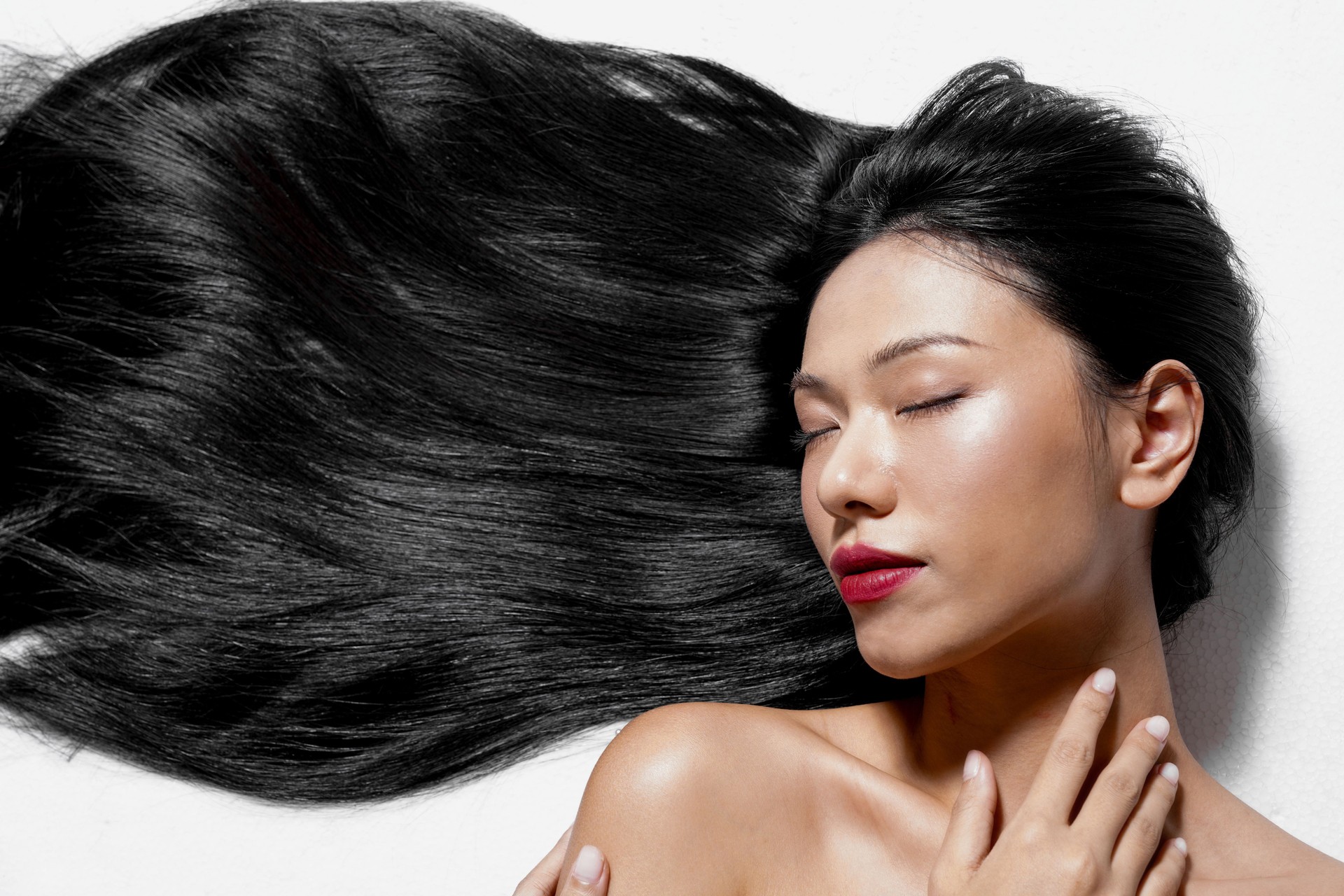 Beauty portrait of a young Asian woman with beautiful long hair